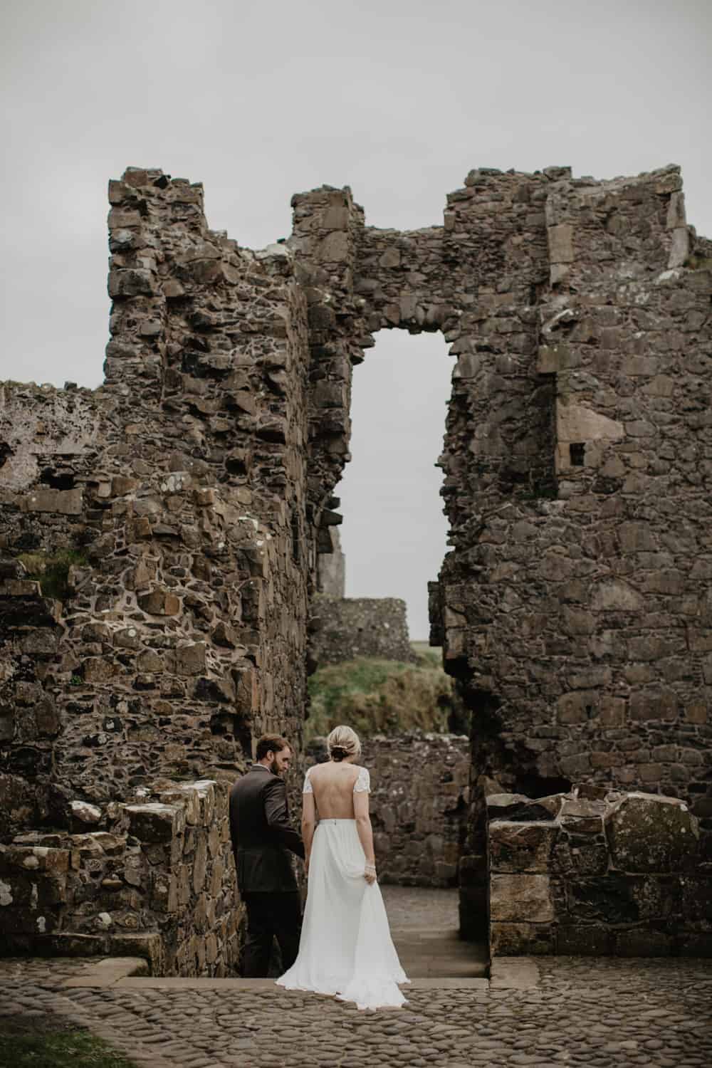 adventure elopement Northern Ireland Dunluce Castle